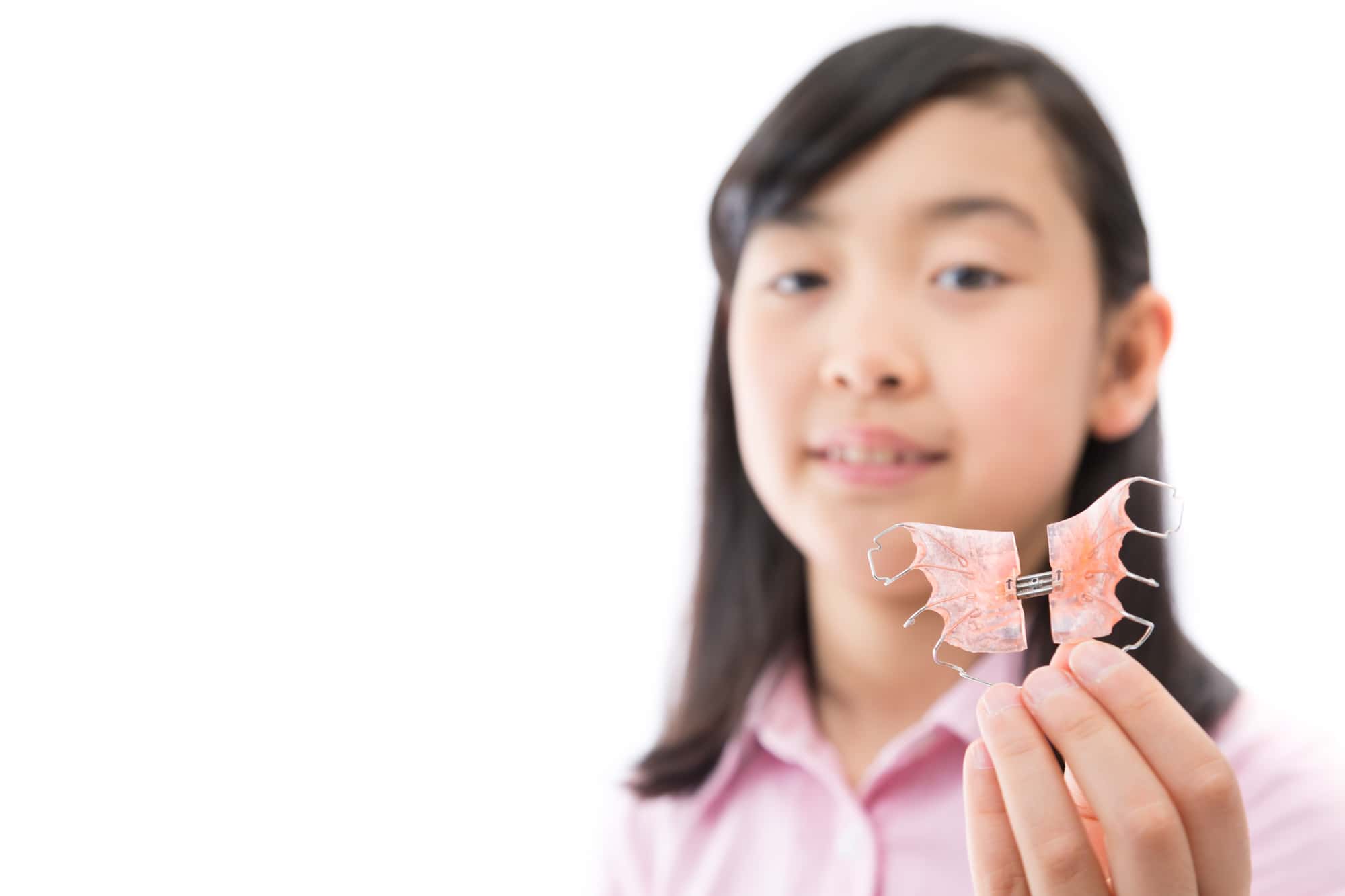  急速拡大装置を手に持つ女の子 